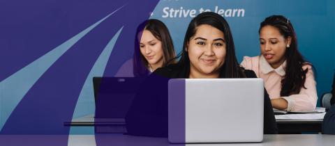 Three women working together on computers